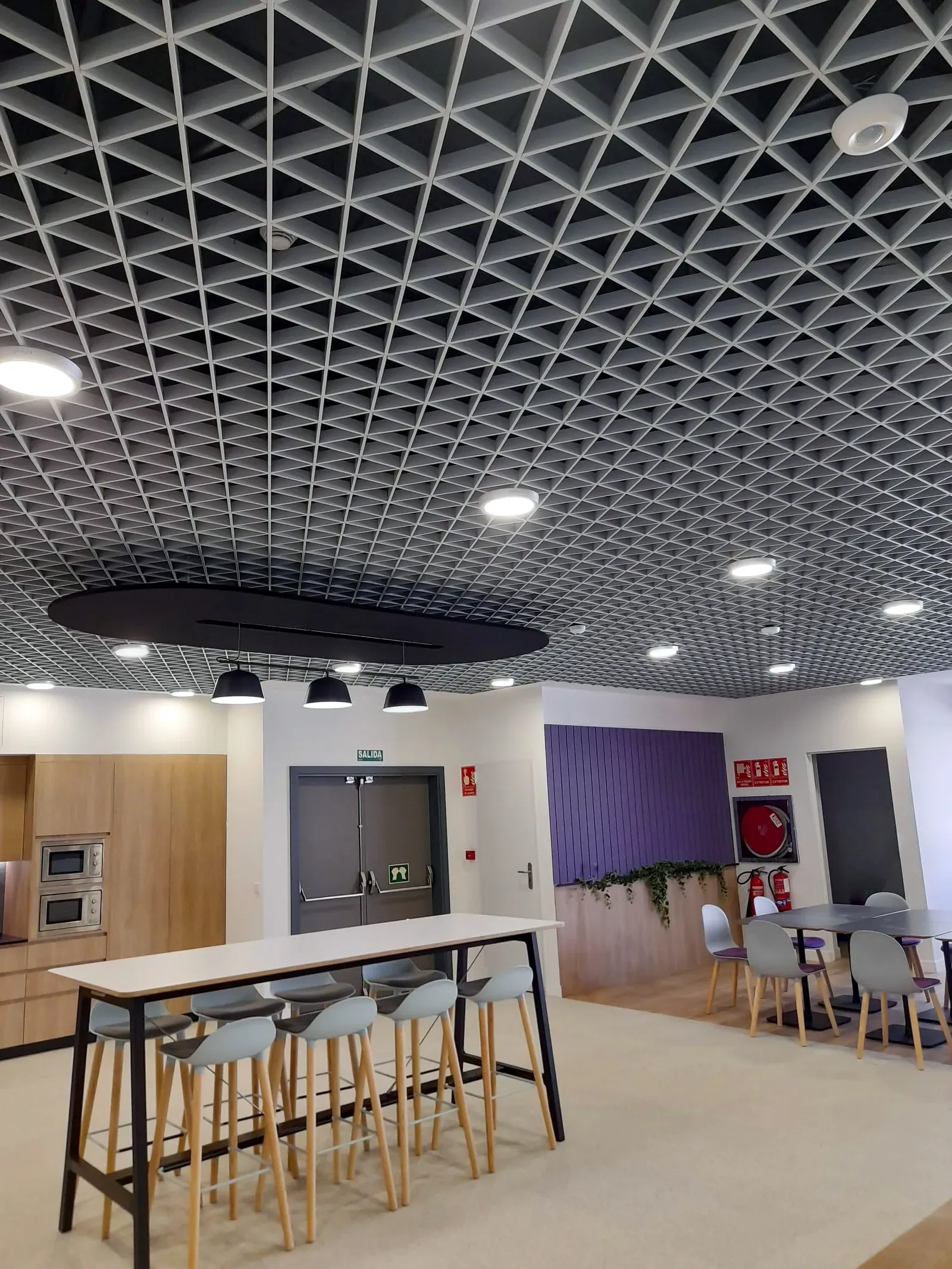 Office ceiling with a visible suspended grid