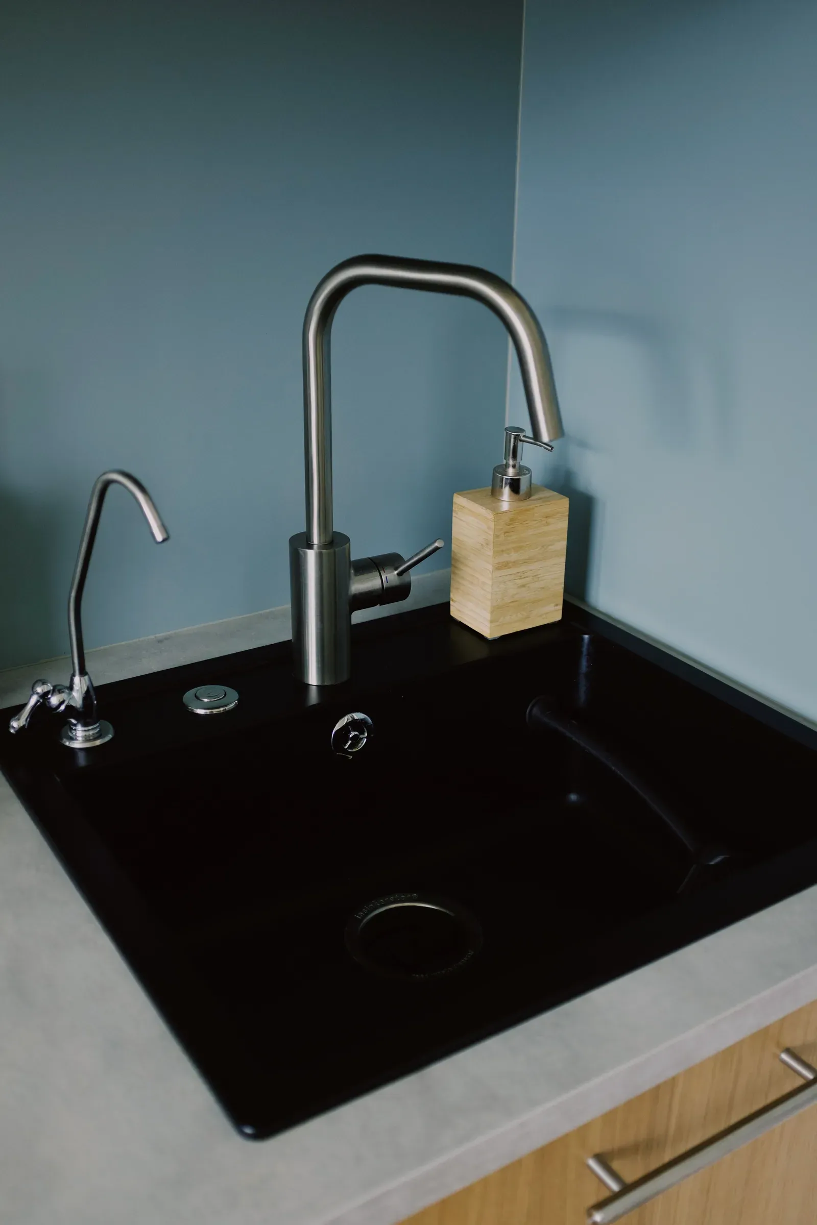 Kitchen sink and tap