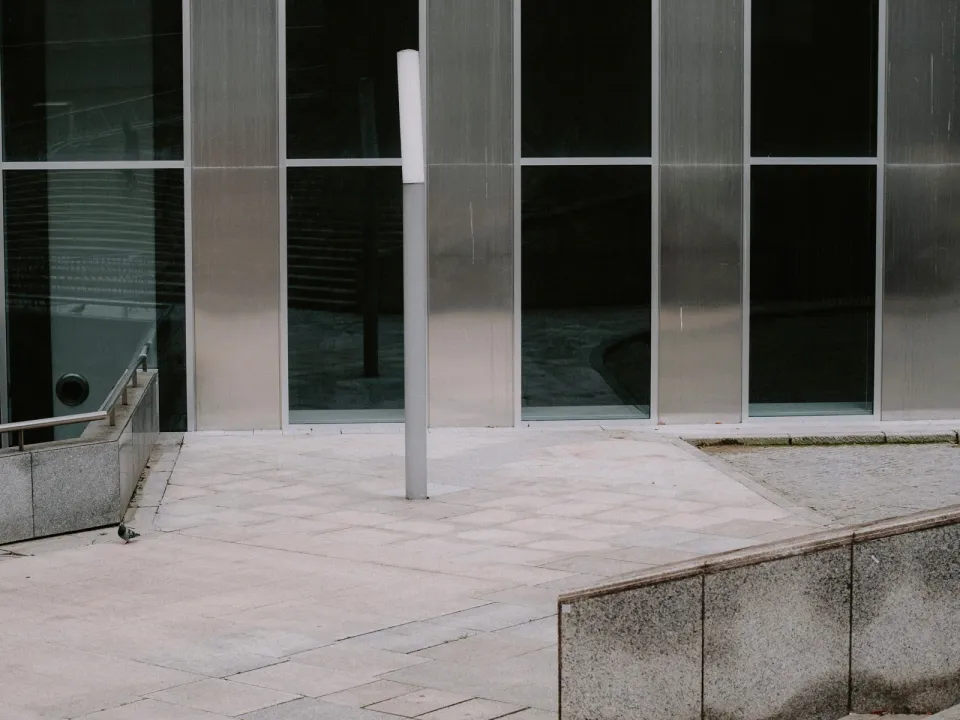 Contemporary metal-clad building facade — illustrative image; actual product may vary