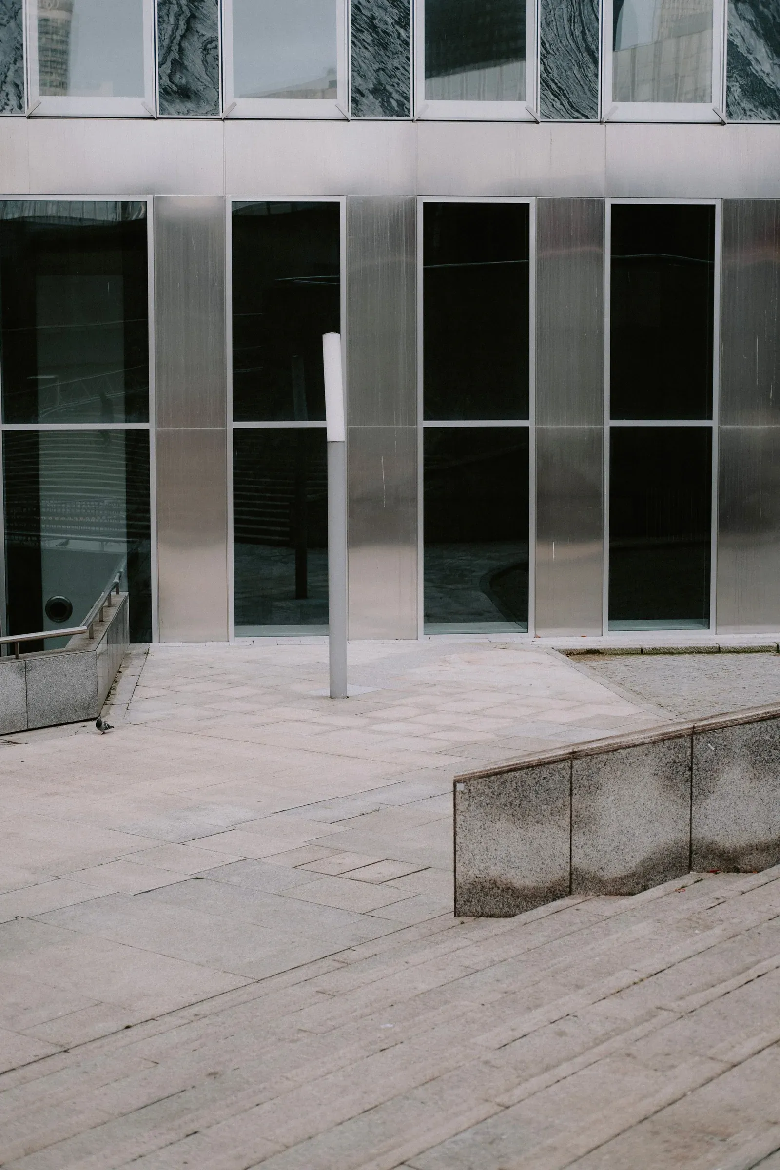 Contemporary metal-clad building facade — illustrative architectural reference